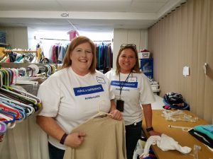 Volunteers sorting clothes at New Journey Community Outreach on United Way of Berks County's Day of Caring