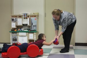 young girl receiving physical therapy at Easterseals