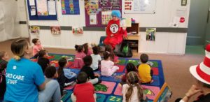 Read Across America Thing 1 reading to children in a classroom