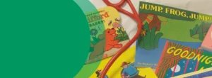 A stethoscope is lying across a variety of children's books