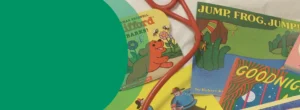 A stethoscope is lying across a variety of children's books